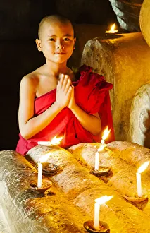 Images Dated 29th April 2013: A buddhist monk praying in the temple, Bagan, Burma / Myanmar