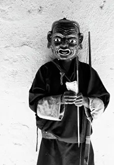 Bhutan Prints: Buddhist monk wearing ancient wooden mask, Gangte Goembe, Gangte, Bhutan, Asia