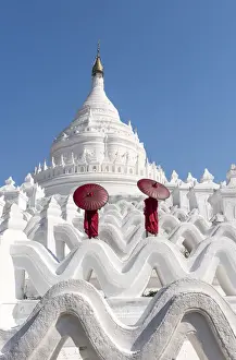 Two Buddhist novice monks on the white pagoda of Hsinbyume (Myatheindan) paya temple
