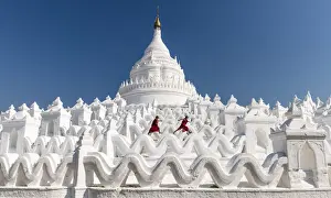 Jumping Prints: Two Buddhist novice monks on the white pagoda of Hsinbyume (Myatheindan) paya temple