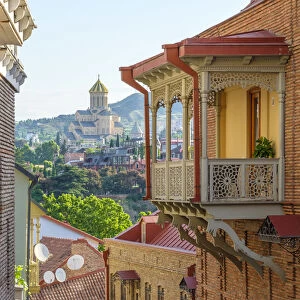 Georgian Gallery: Buildings in old town Abanotubani bath district with Holy Trinity Cathedral in background