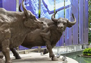Central Prints: Bull statues outside The Center skyscraper, Central, Hong Kong Island, Hong Kong, China
