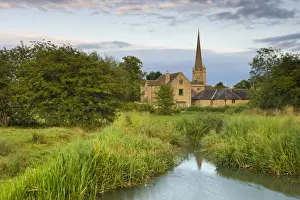 Cotswolds Prints: Burford Mill and Church viewed from the River Windrush in the water meadows, Burford