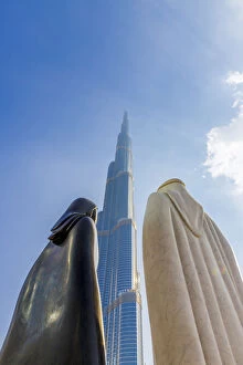 Burj Khalifa and the Arabic Couple Statue (Together by Lufti Romein), Dubai
