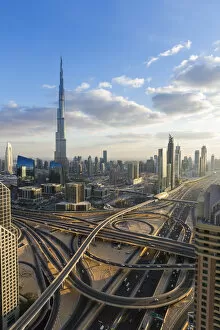 Images Dated 19th March 2015: The Burj Khalifa Dubai, elevated view across Sheikh Zayed Road and Financial Centre