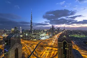 Steel Prints: The Burj Khalifa Dubai, elevated view across Sheikh Zayed Road and Financial Centre