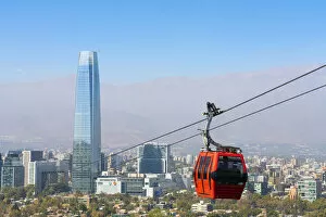 Andes Collection: Cable car with Gran Torre Santiago in background, Santiago Metropolitan Park, San Cristobal Hill