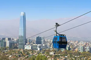 Images Dated 26th May 2022: Cable car with Gran Torre Santiago in background, Santiago Metropolitan Park, San Cristobal Hill