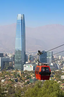 Images Dated 26th May 2022: Cable car with Gran Torre Santiago in background, Santiago Metropolitan Park, San Cristobal Hill