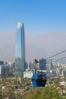 Images Dated 26th May 2022: Cable car with Gran Torre Santiago in background, Santiago Metropolitan Park, San Cristobal Hill