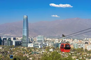 Images Dated 26th May 2022: Cable car with Gran Torre Santiago in background, Santiago Metropolitan Park, San Cristobal Hill