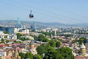 Aerial Tramway Prints: Cable car between Rike Park and the Narikala fortress passes above buildings in central