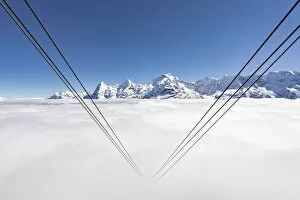 Images Dated 22nd April 2022: Cableway hidden by fog with Eiger, Monch and Jungfrau, Murren Birg, Berner Oberland, Switzerland