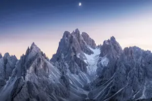 Time Of Day Prints: The Cadini di Misurina taking the last light of the day with the rising moon above them