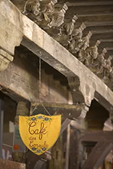 Pyrenees Prints: Cafe Sign & Carved Arcade Rafters, Maison des Consuls, Mirepoix, Ariege, Midi-Pyrenees