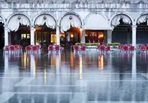 Caffa Quadri reflected in high tide water (Acqua alta), Venice, Veneto, Italy, Europe