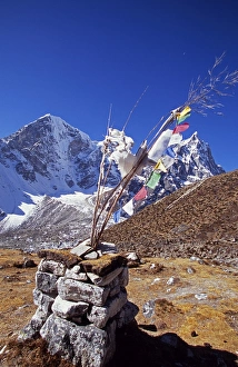 Everest Region Gallery: Cairn and prayer flags in the Dzonglha area