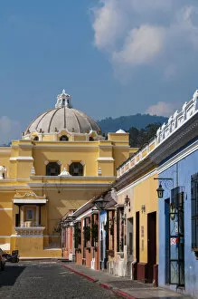 Guatemala Gallery: Calle de Santa Catalina and in the background La Merced church, Antigua, Guatemala
