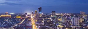 Cambodia, Phnom Penh, elevated city skyline along Monivong Boulevard, dusk