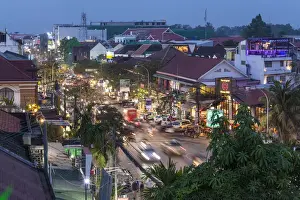 Area Prints: Cambodia, Siem Reap, evening traffic on Sivatha Street, high angle view