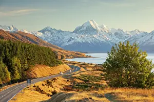 South Island Prints: Camper Vans heading along a winding road towards Mount Cook