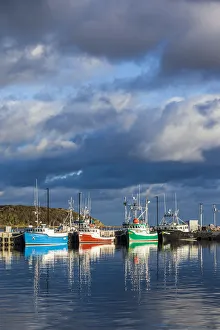 Canada, Nova Scotia, Cabot Trail, Cheticamp, town harbor with fishing boats, dawn