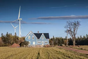 Images Dated 26th March 2019: Canada, Prince Edward Island, West Cape, farmhouse and wind turbines