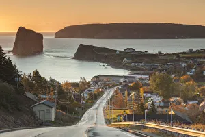 Canada, Quebec, Gaspe Peninsula, Perce, elevated view of town and Perce Rock from Rt 132