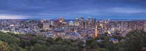 French Canadian Collection: Canada, Quebec, Montreal, elevated skyline from Mount Royal, dusk