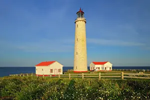 Lawrence Prints: One of Canada's tallest lighthouses on rugged cliffs at the entrance of the Gulf of St