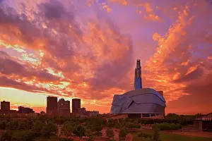 Antoine Predock Architect Prints: Canadian Museum for Human Rights (CMHR) with the city of Winnipeg in background at sunset