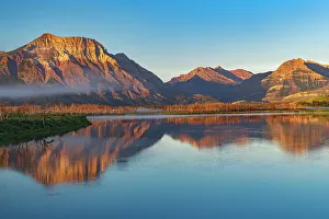 Q2 2023 Collection: Canadian Rocky Mountains (Vimy Peak on the left) reflected in Lower Waterton Lake Waterton Lakes