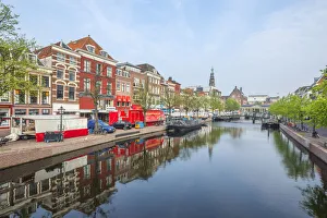 Zuid Holland Prints: Canal with market and town hall at Leiden, South Holland, The Netherlands