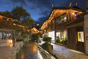 Guesthouse Prints: Canalside buildings at dusk, Lijiang (UNESCO World Heritage Site), Yunnan, China