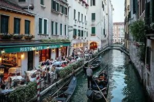 Dining Prints: Canalside restaurant at dusk, Venice, Veneto, Italy