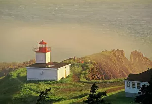 Lighthouses Collection: Cape d‚AoOr Lighthouse on the Bay of Fundy in fog Advocate Harbour, Nova Scotia, Canada