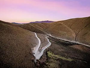 Jujuy Prints: Car on winding road, Serrania de Hornocal, Humahuaca, Jujuy, Argentina
