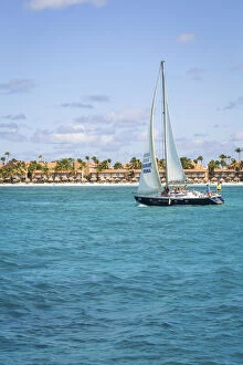 Caribbean, Aruba, Oranjestad, A sail boat in the area of Druif Beach