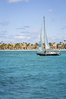 Caribbean, Aruba, Oranjestad, A sail boat in the area of Druif Beach