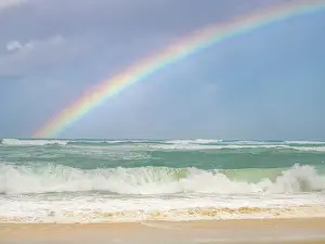 Rainbows Prints: The Caribbean Sea at Seven Mile Beach during a severe weather warning with gale force winds