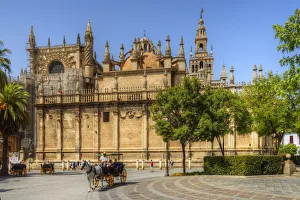 Coach Prints: Carriage at Plaza del Triunfo with Cathedral, UNESCO World Heritage Site; Sevilla