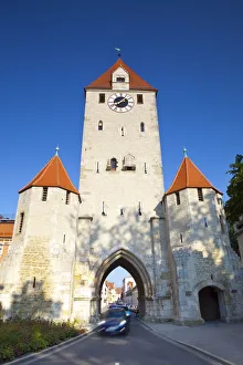 City Gate Prints: Cars pass under the Eastern Gate, Regensburg, Bavaria, Germany