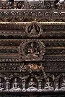 Carved Prints: Carved buddhas above a door at The Dwarika's Hotel, Kathmandu, Nepal