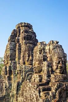 Carved stone faces at Prasat Bayon temple ruins, Angkor Thom, UNESCO World Heritage Site