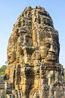 Carved stone faces at Prasat Bayon temple ruins, Angkor Thom, UNESCO World Heritage Site
