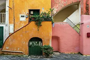 Tyrrhenian Prints: Casale Vascello, a cluster of colorful old houses in an internal courtyard