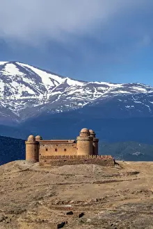 Castillo de la Calahorra castle with the Sierra Nevada mountain range in the background