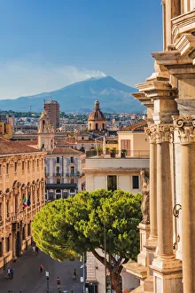 Catania, Sicily. Elevated view of the town with Etna volcano in the background