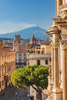 Catania, Sicily. Elevated view of the town with Etna volcano in the background