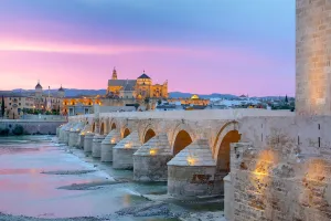 Images Dated 16th April 2015: Cathedral (Mezquita) and Roman bridge at sunset, Guadalquivir river, Cordoba, Andalusia